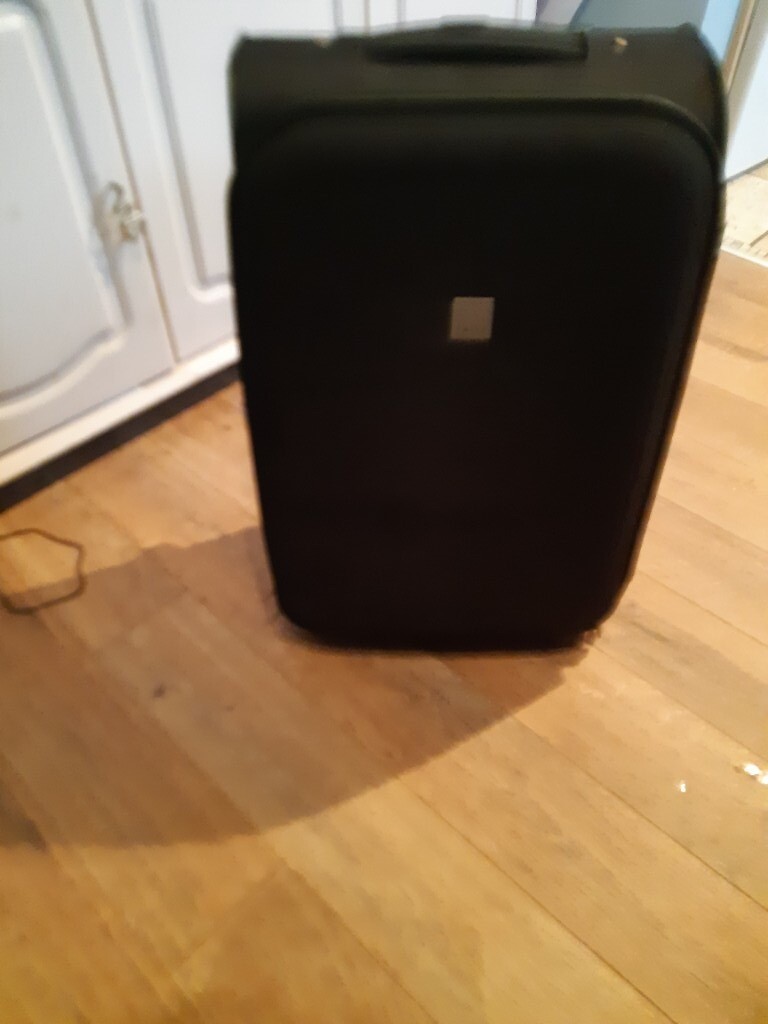 tripp large black suitcase